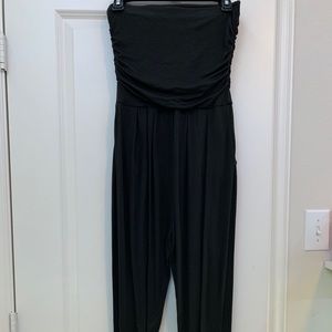 Green and black jump suit.